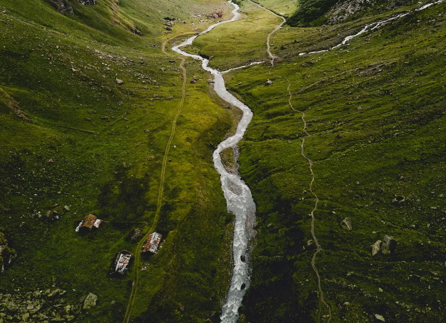aerial photography of river between mountains